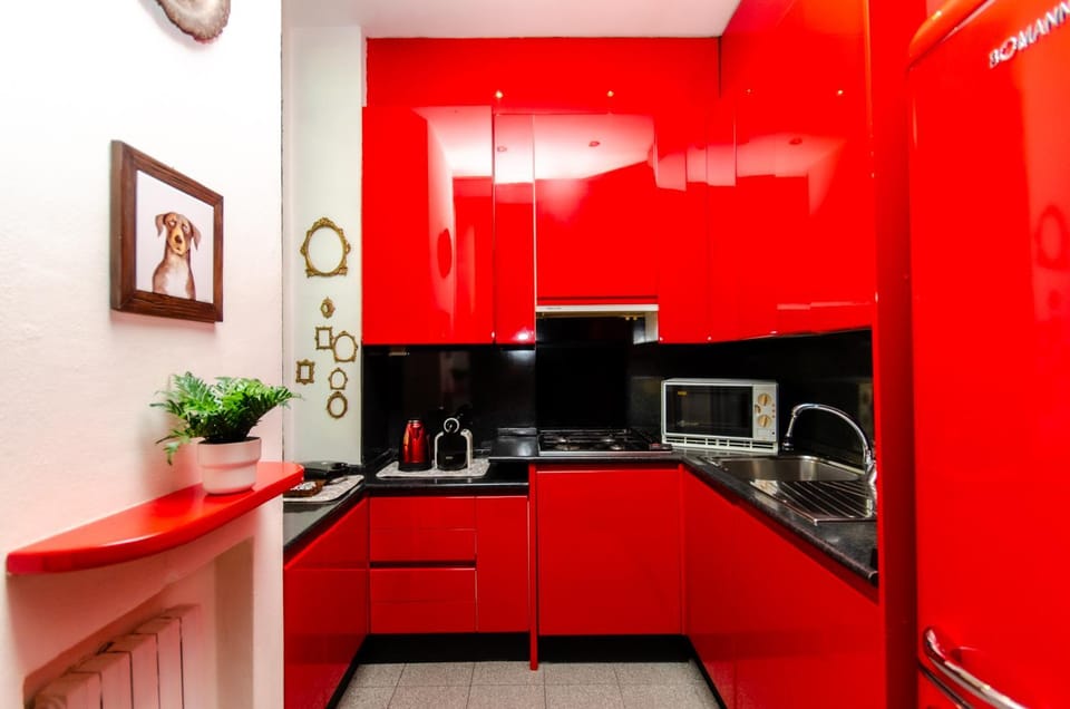 Kitchen or kitchenette, dishwasher, oven, stove
