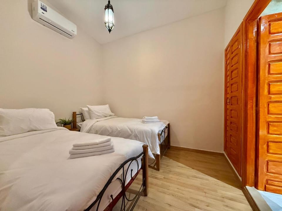 Bed, Photo of the whole room, Bedroom, towels, wardrobe, air conditioner