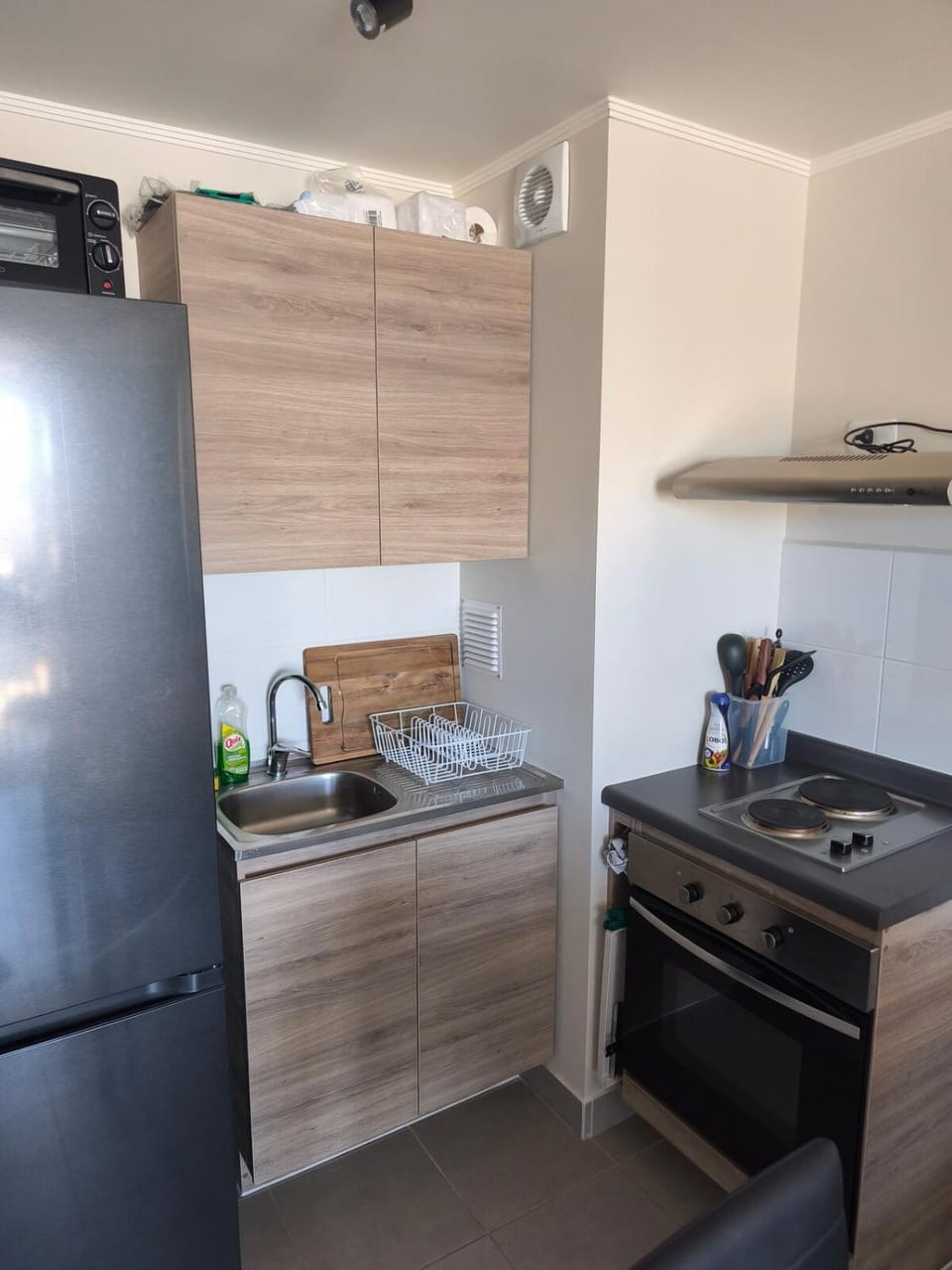 Kitchen or kitchenette, oven