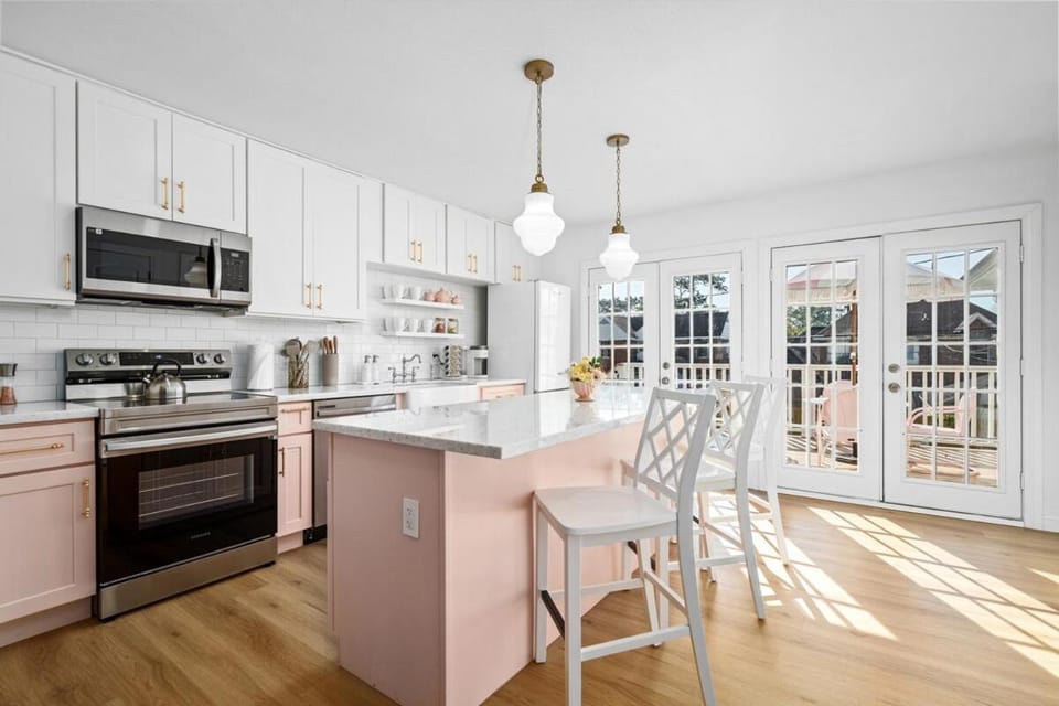 Kitchen or kitchenette, dishwasher, oven, stove