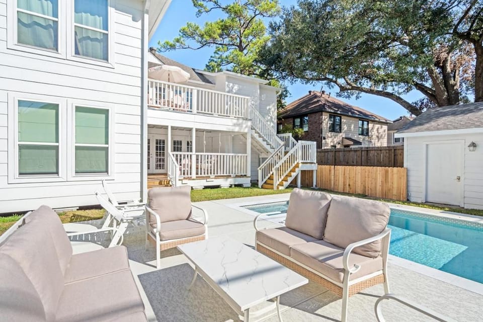Property building, Patio, Seating area, Pool view, Swimming pool