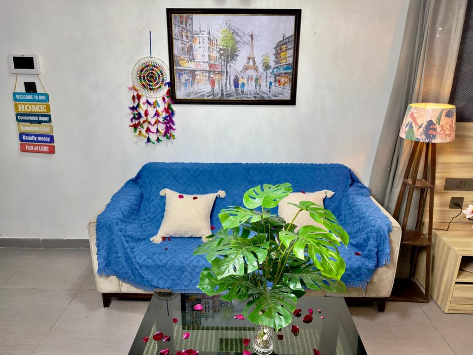 River by Day, City by Night Twin Views Supernova Apartment in Noida