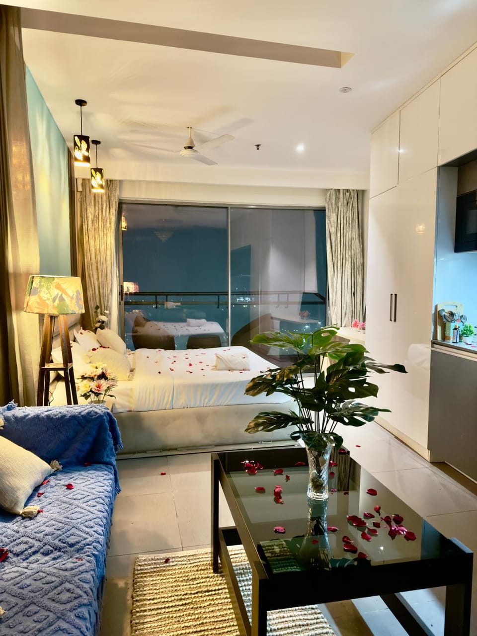 River by Day, City by Night Twin Views Supernova Apartment in Noida