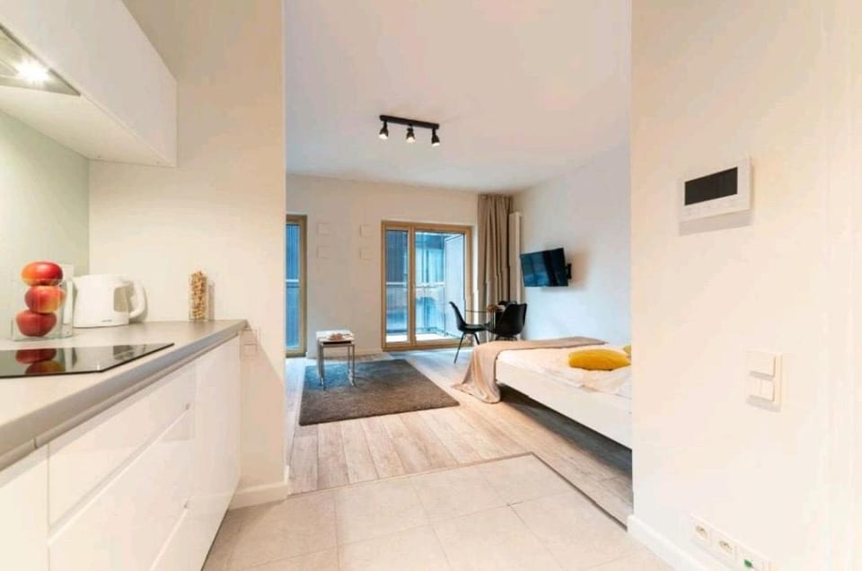Bed, TV and multimedia, Kitchen or kitchenette, Living room, Photo of the whole room