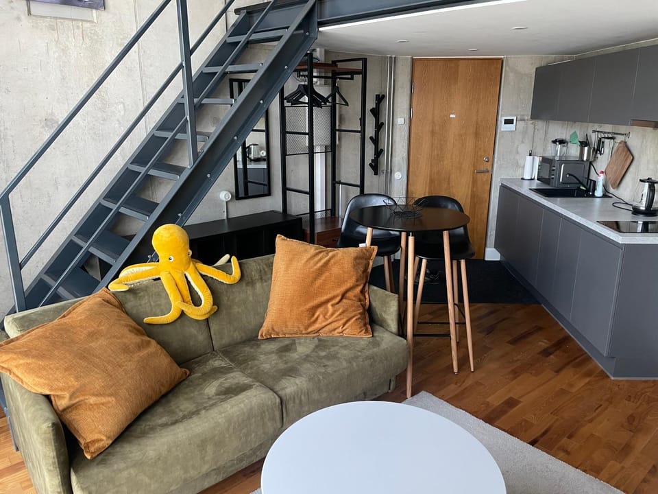Modern loft in the middle of the city, parking space, TV game Apartment in Tallinn