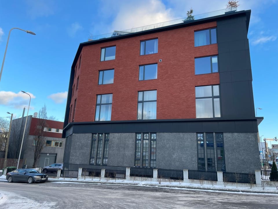 Modern loft in the middle of the city, parking space, TV game Apartment in Tallinn