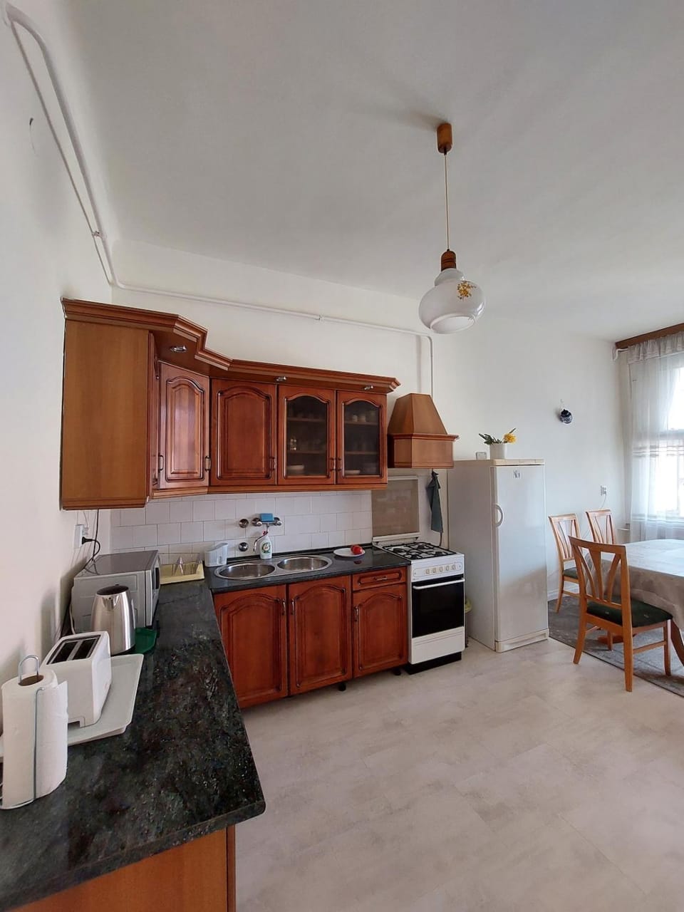 Kitchen or kitchenette, oven, toaster