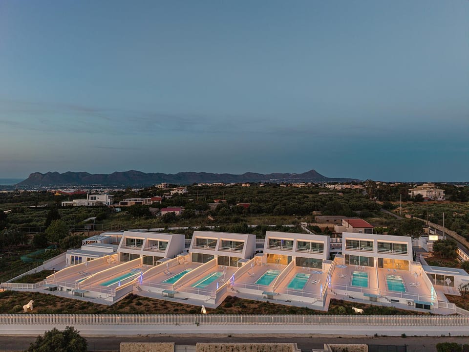 Property building, Natural landscape, Bird's eye view, Pool view, Sea view, Sunset