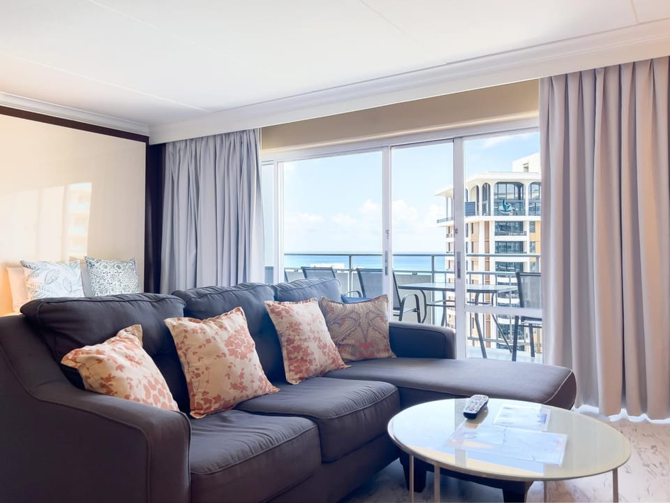 Living room, Seating area, City view, Sea view