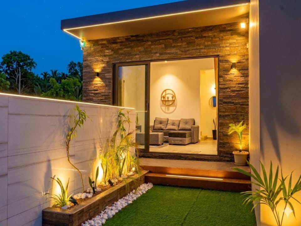Property building, Night, Garden, Living room, Seating area, Garden view
