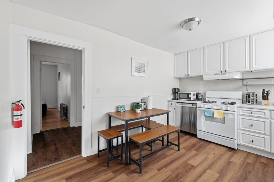 Dining area, dishwasher, oven, stove, toaster