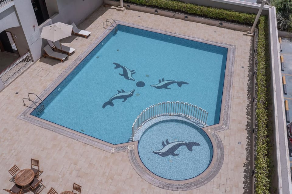 Free housekeeping visits during your stay - StayShort - Chic Studio Near Miracle Garden with Patio Apartment in Dubai