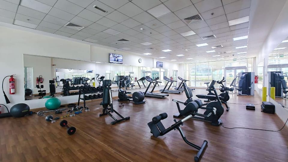 Free housekeeping visits during your stay - StayShort - Chic Studio Near Miracle Garden with Patio Apartment in Dubai