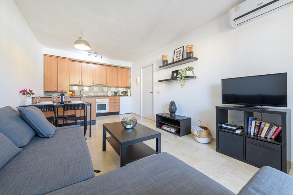 Living room, Dining area, oven, stove, kitchen, air conditioner