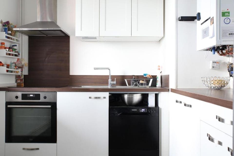 Kitchen or kitchenette, dishwasher, oven, stove, toaster