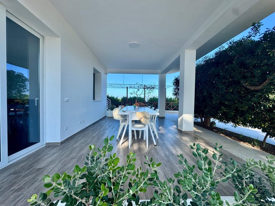 Property building, Patio, Dining area, Garden view