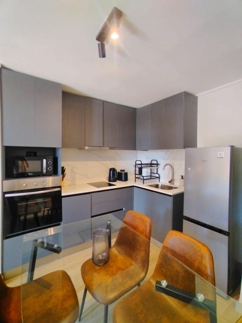 Kitchen or kitchenette, Living room, Dining area, oven, stove, toaster