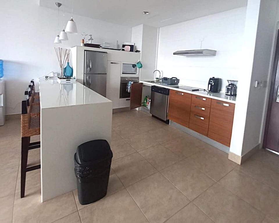 Kitchen or kitchenette, dishwasher, oven, stove, toaster