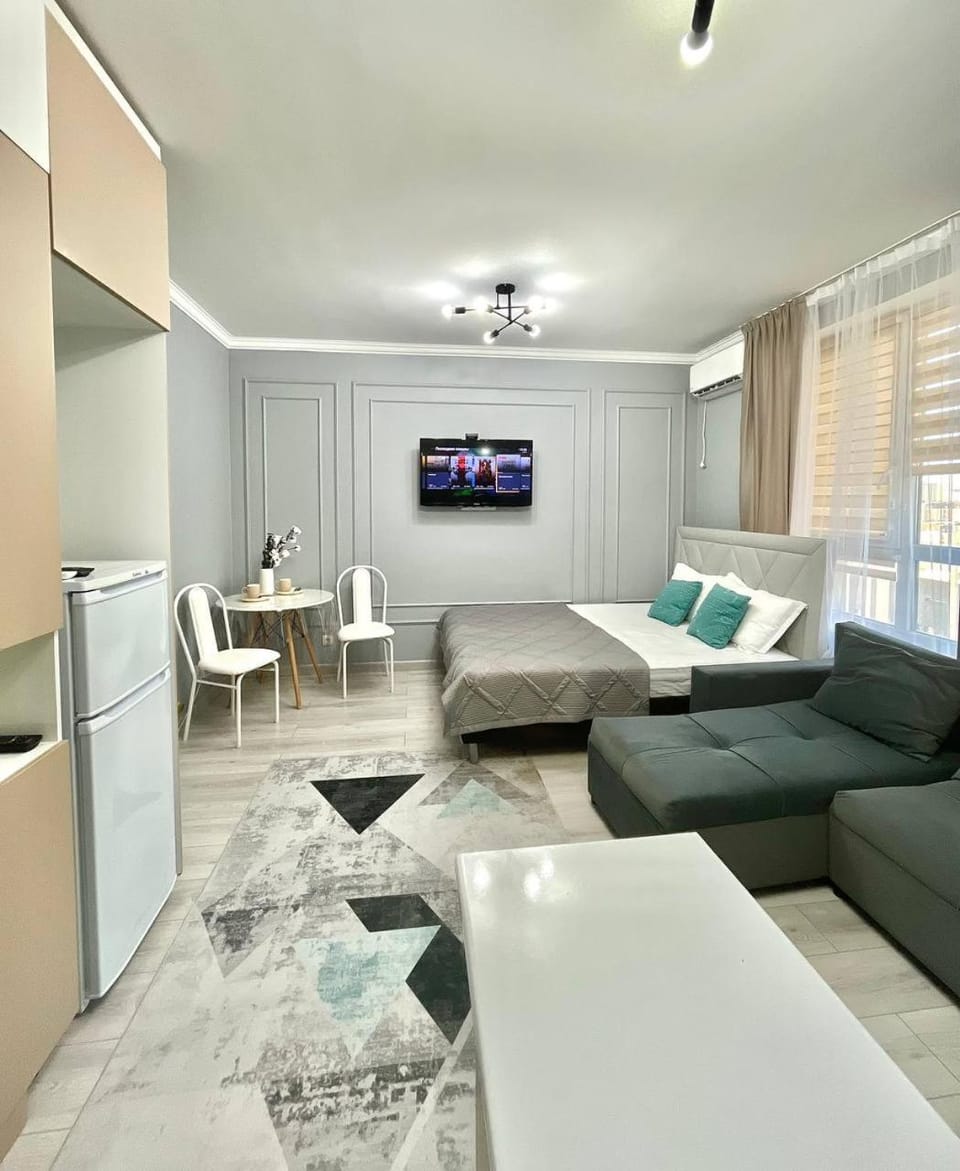 Communal lounge/ TV room, Bed, TV and multimedia, Kitchen or kitchenette, Living room, Photo of the whole room, Seating area, Dining area, Evening entertainment, Bedroom, fireplace