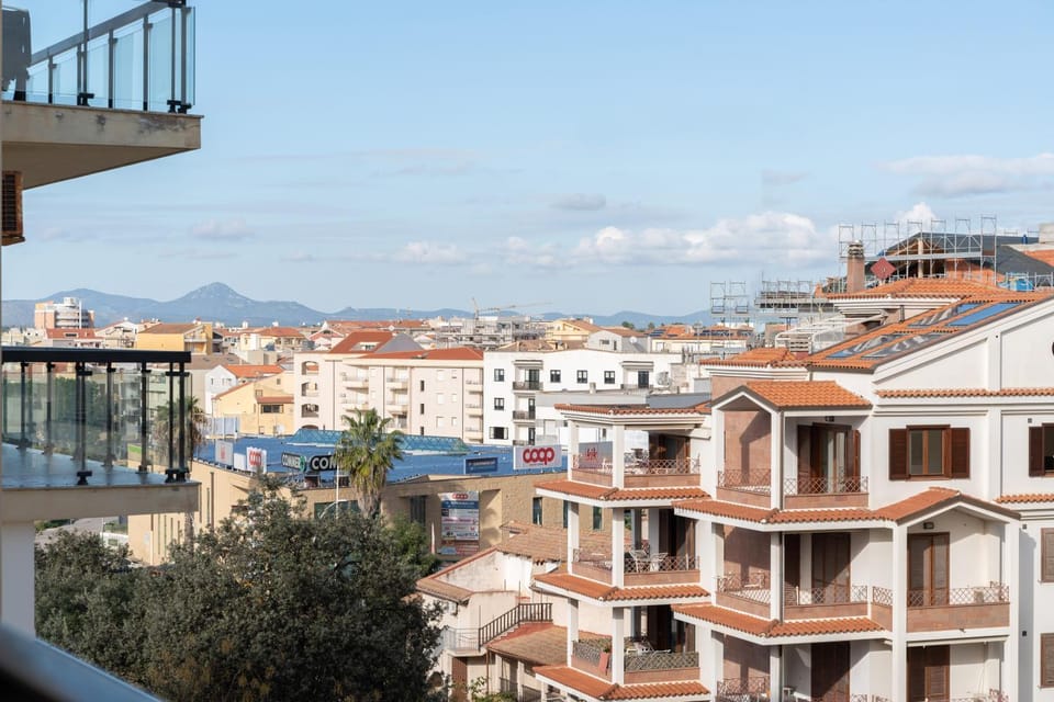Property building, Day, View (from property/room), Balcony/Terrace, City view