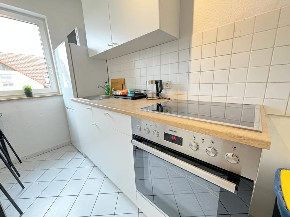 Kitchen or kitchenette, microwave, oven, stove, stove, kitchen, kitchen