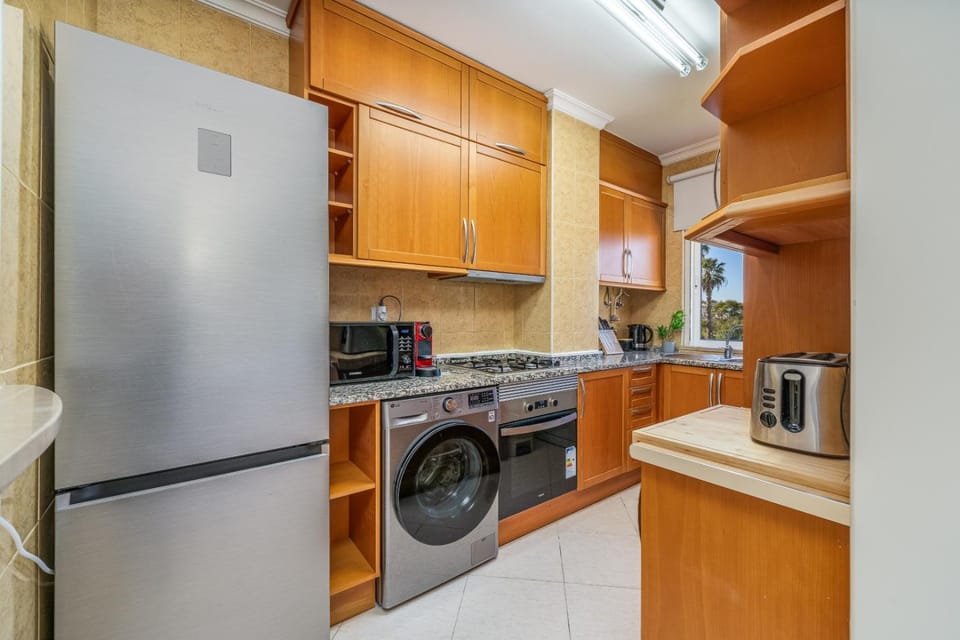 Coffee/tea facilities, Kitchen or kitchenette, Garden view, Pool view, dishwasher, internet, microwave, oven, stove, toaster, washing machine