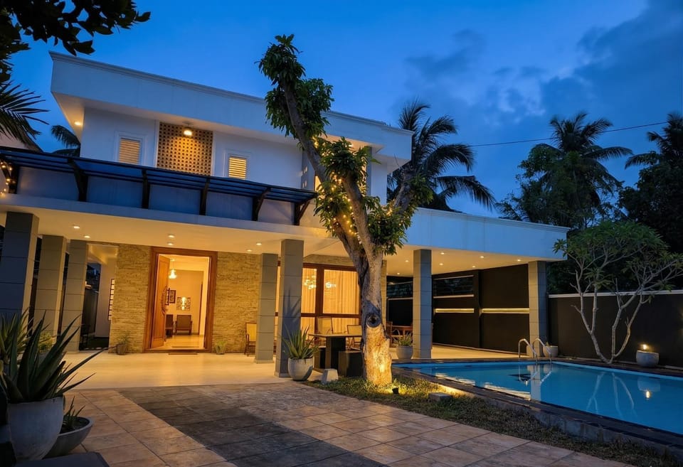 Property building, Patio, Night, Pool view, Swimming pool