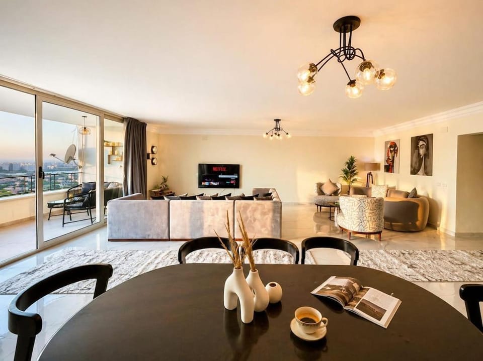 Exclusive 3BR Retreat Nile and Pyramids Views Maadi Prime location Apartment in Cairo Governorate
