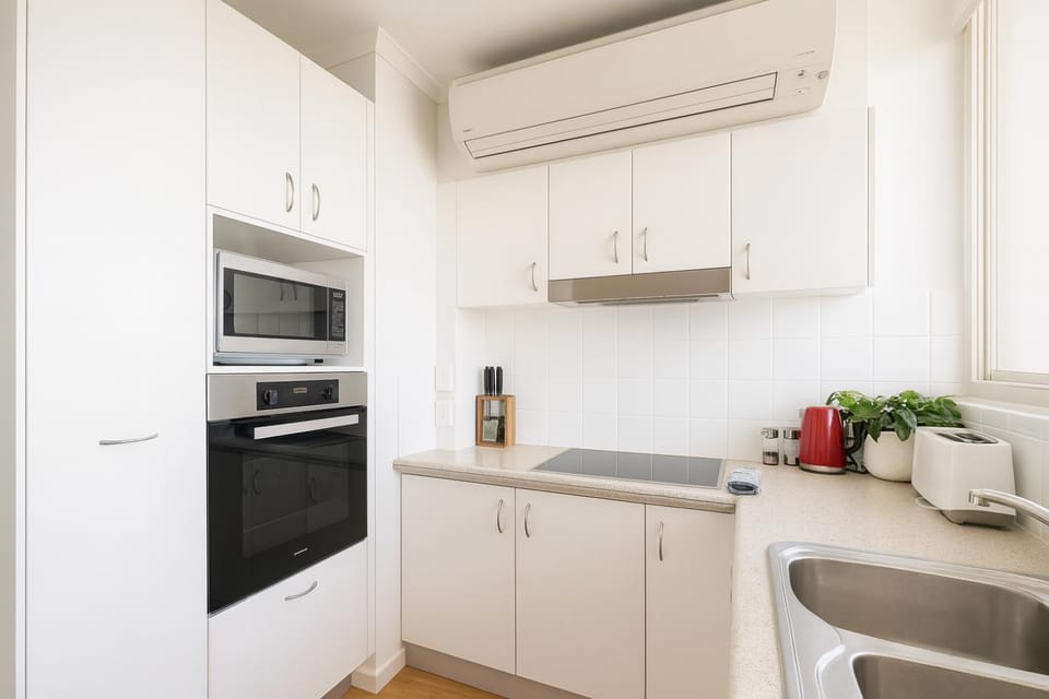 Kitchen or kitchenette, oven, stove