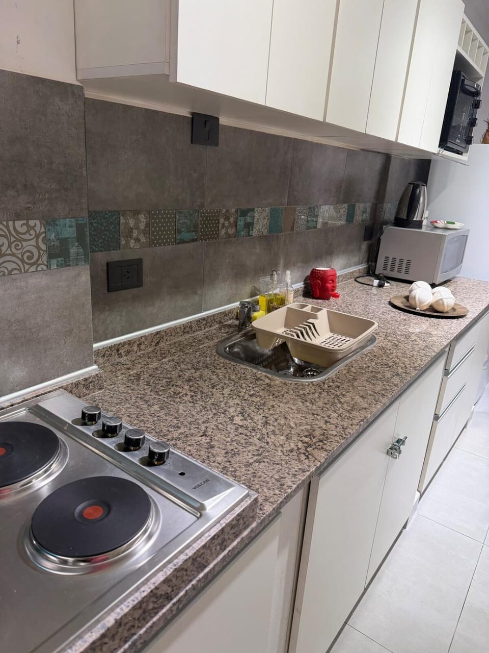 Kitchen or kitchenette, stove