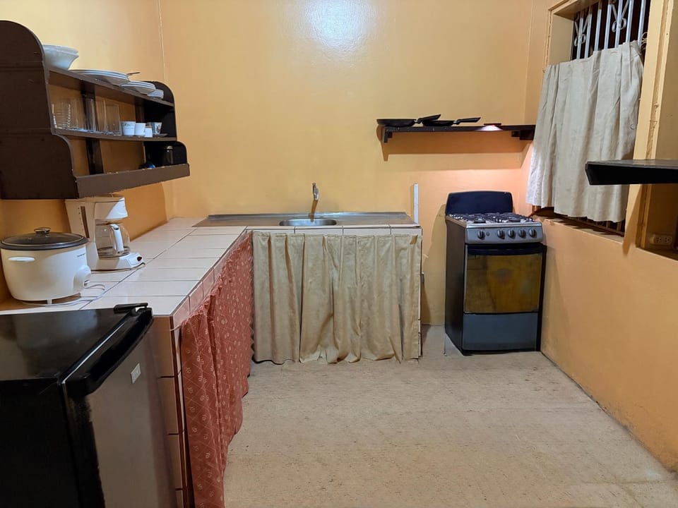 Kitchen or kitchenette, stove