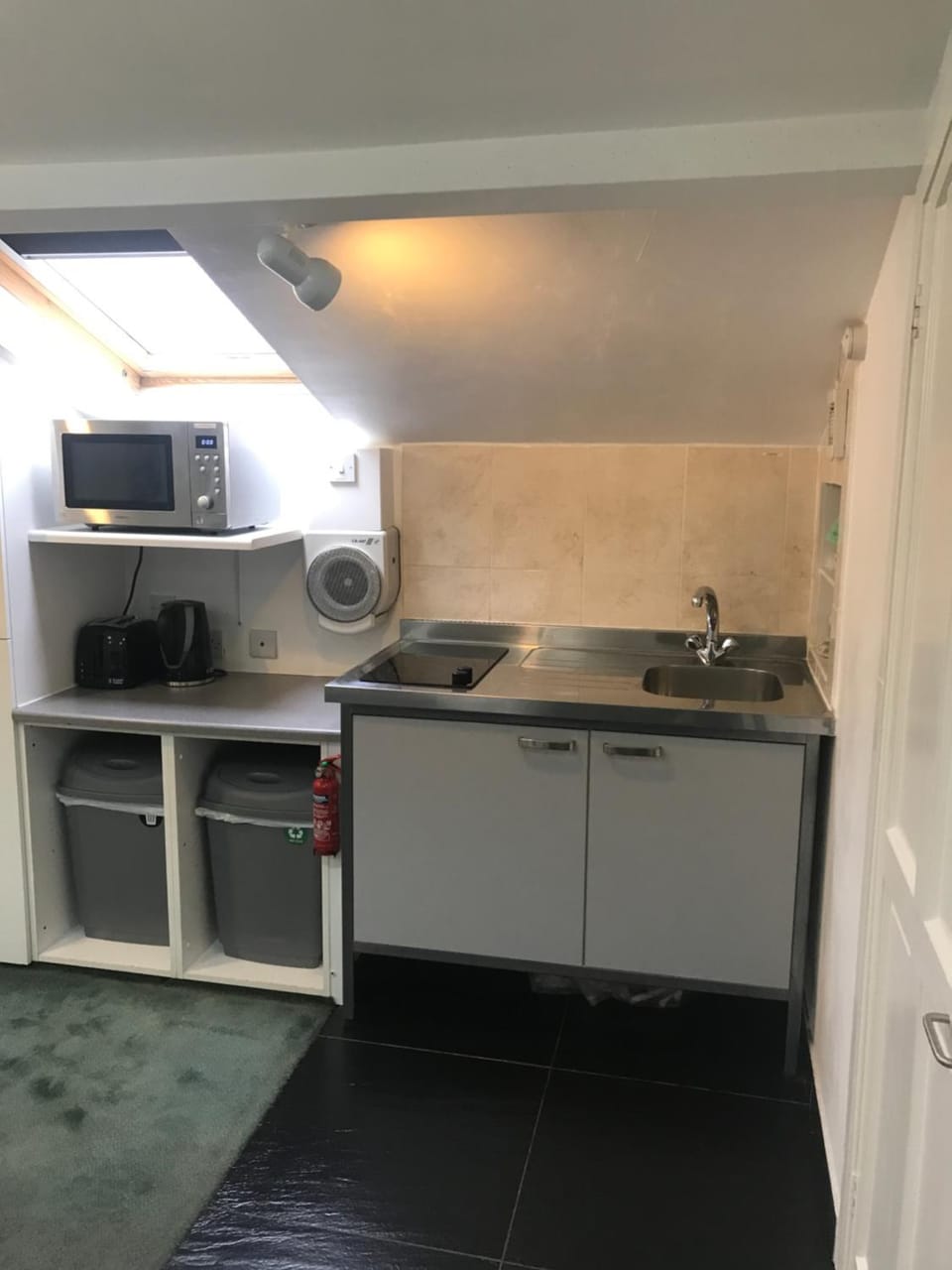 Kitchen or kitchenette, stove, toaster
