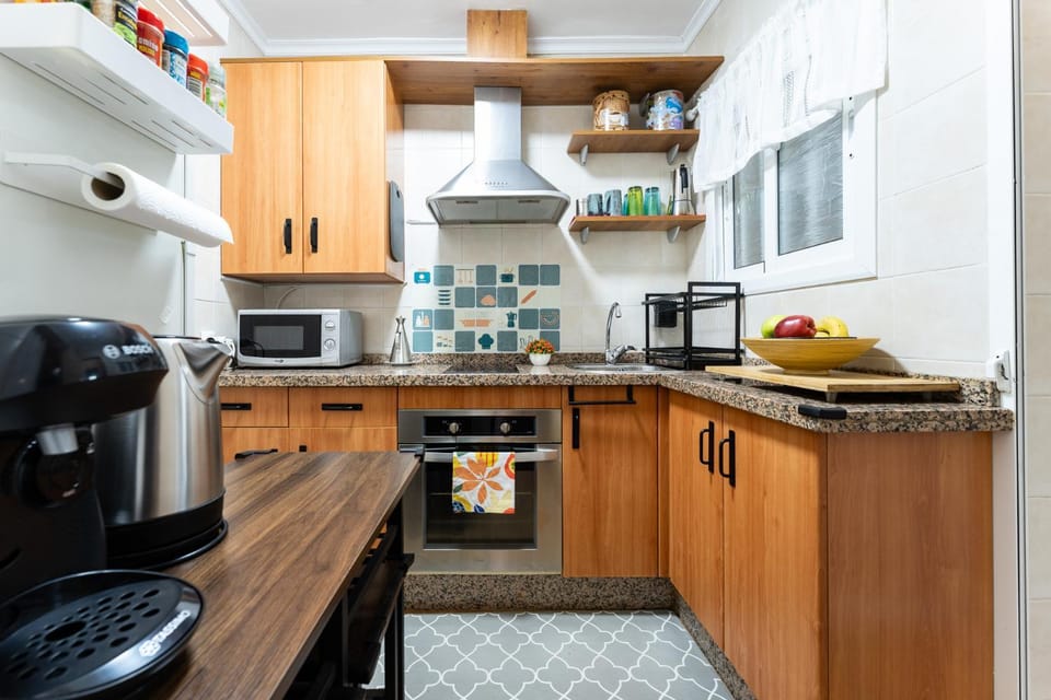 Kitchen or kitchenette, microwave, oven, stove, toaster