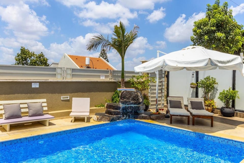 Property building, Patio, Garden, Pool view, Swimming pool