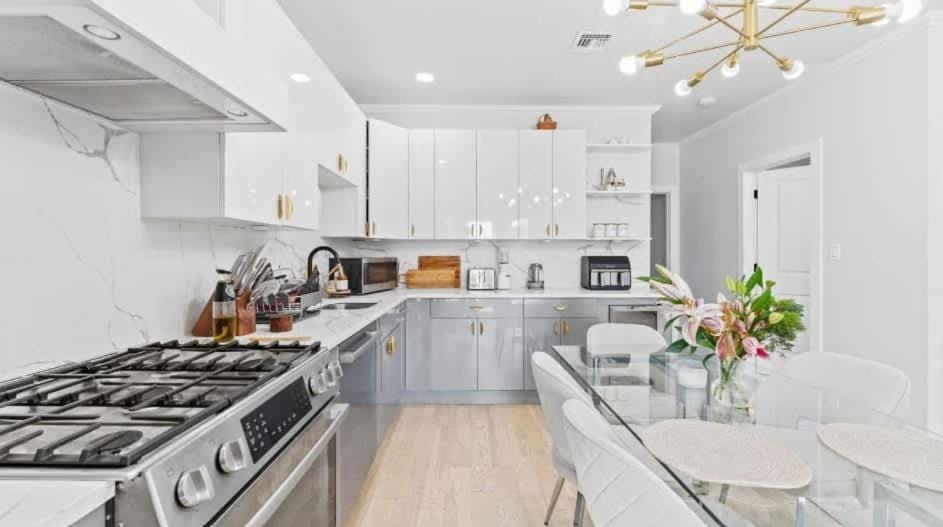 Kitchen or kitchenette, Dining area, dishwasher, oven, stove, toaster
