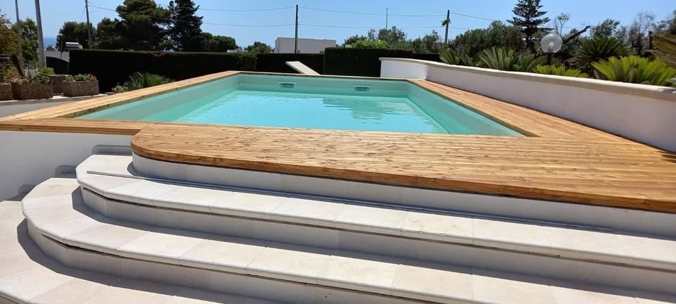 Property building, Living room, Swimming pool