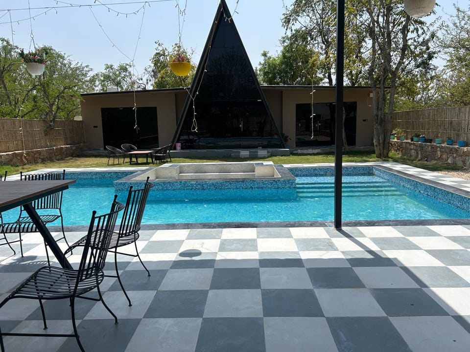 Property building, Patio, Day, Pool view, Swimming pool
