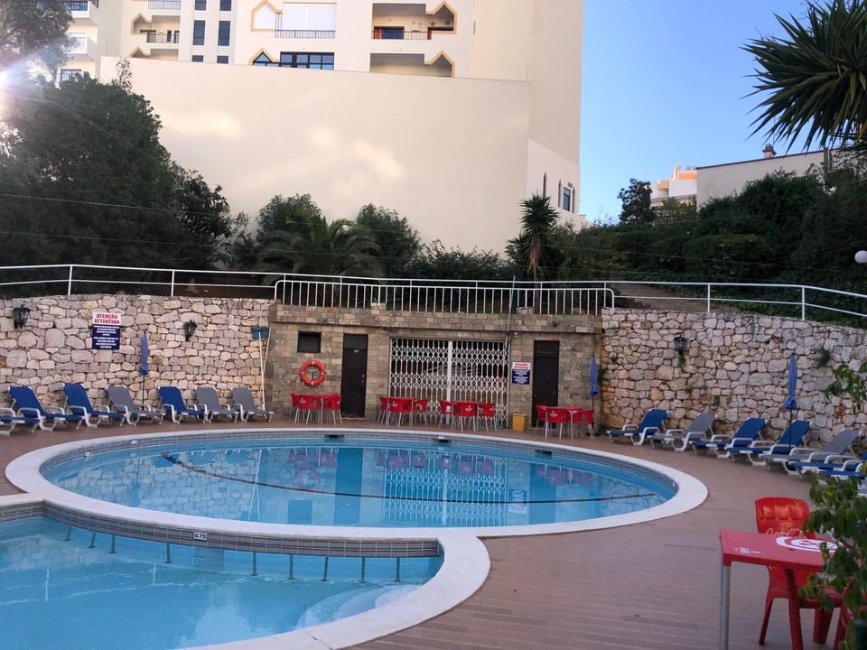Property building, Living room, Swimming pool