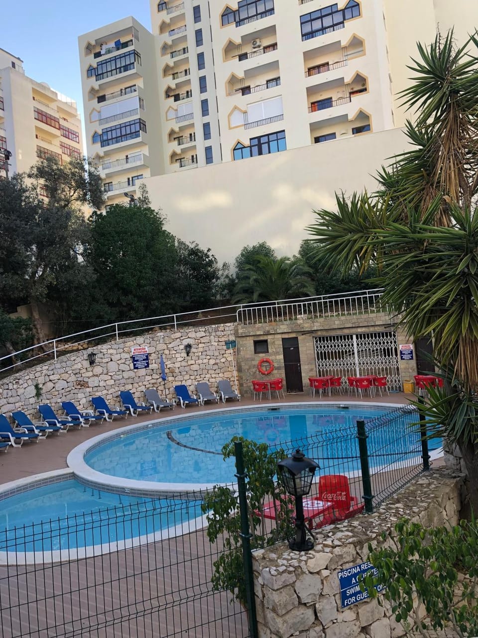 Property building, Living room, Swimming pool