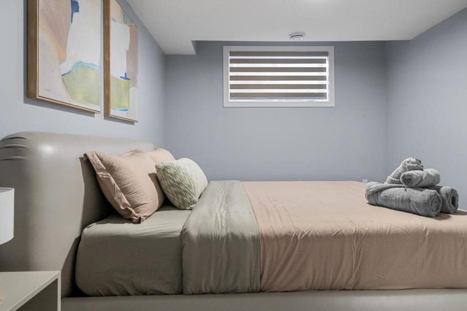 1BR Entertainment Space Projector and Games Room Apartment in Airdrie