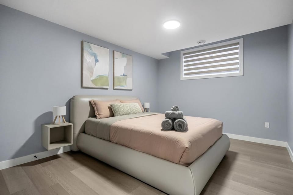 1BR Entertainment Space Projector and Games Room Apartment in Airdrie