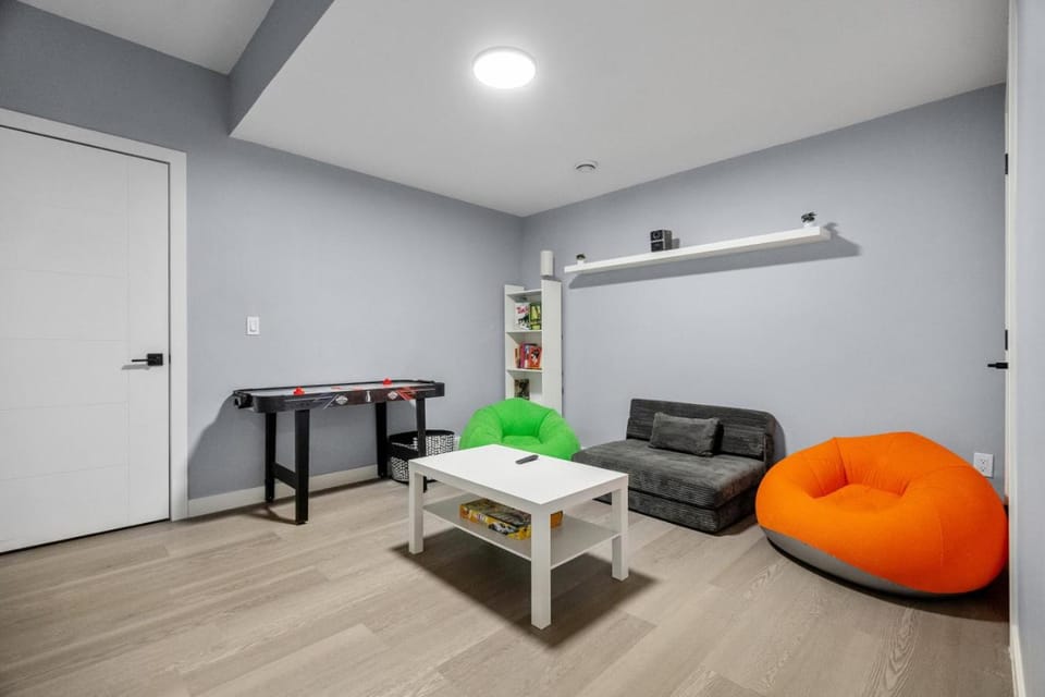 1BR Entertainment Space Projector and Games Room Apartment in Airdrie