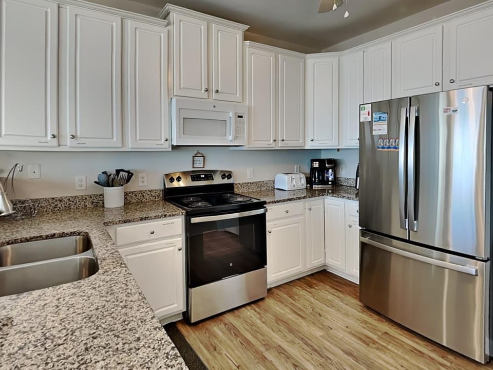 Kitchen or kitchenette, microwave, oven, stove, kitchen