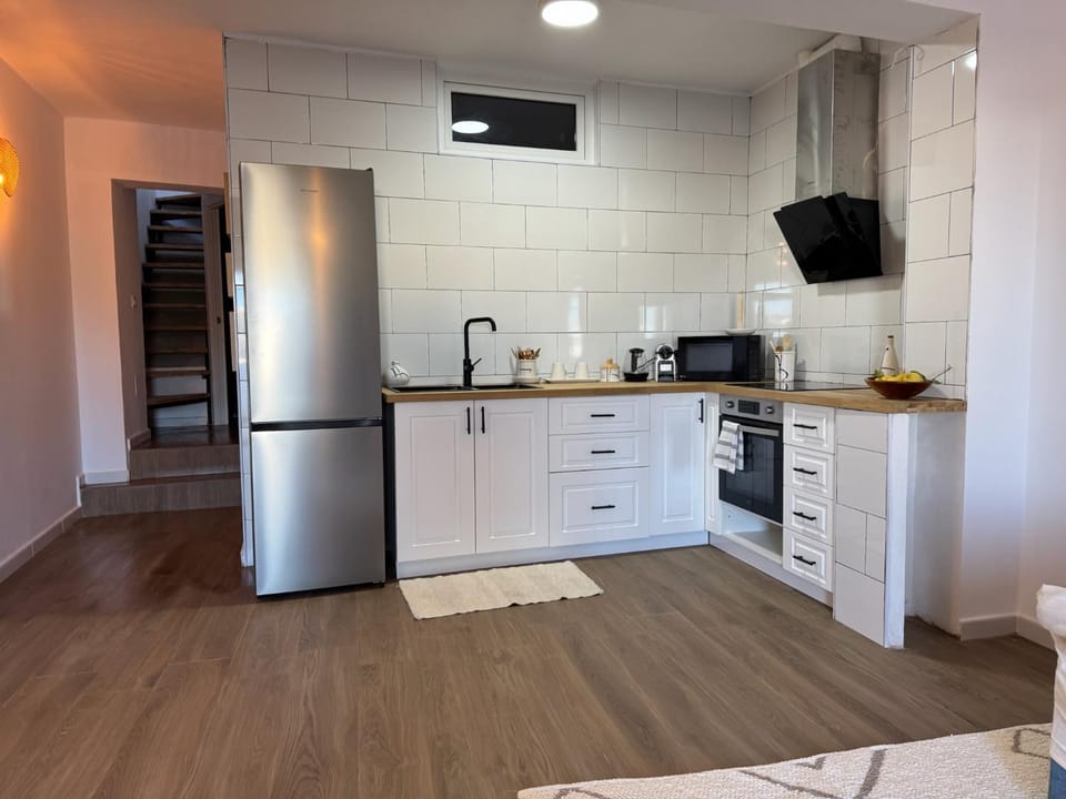 Kitchen or kitchenette, oven, stove