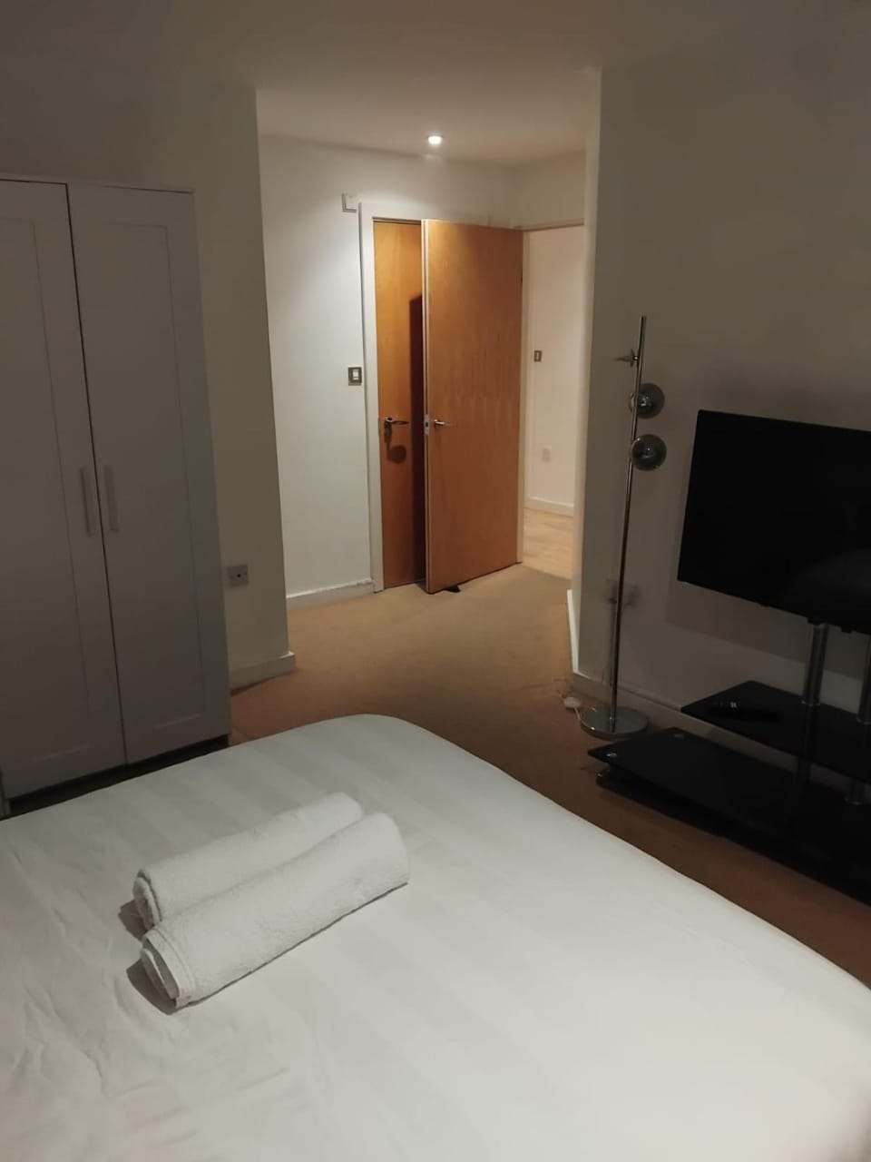 Bed, TV and multimedia, Bedroom, towels, wardrobe