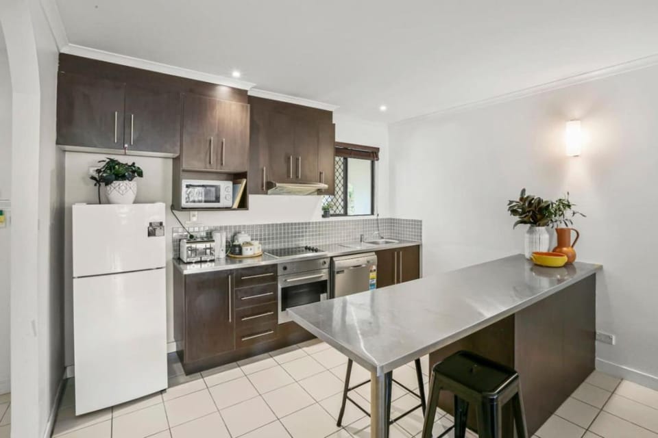 Kitchen or kitchenette, dishwasher, oven, stove, toaster