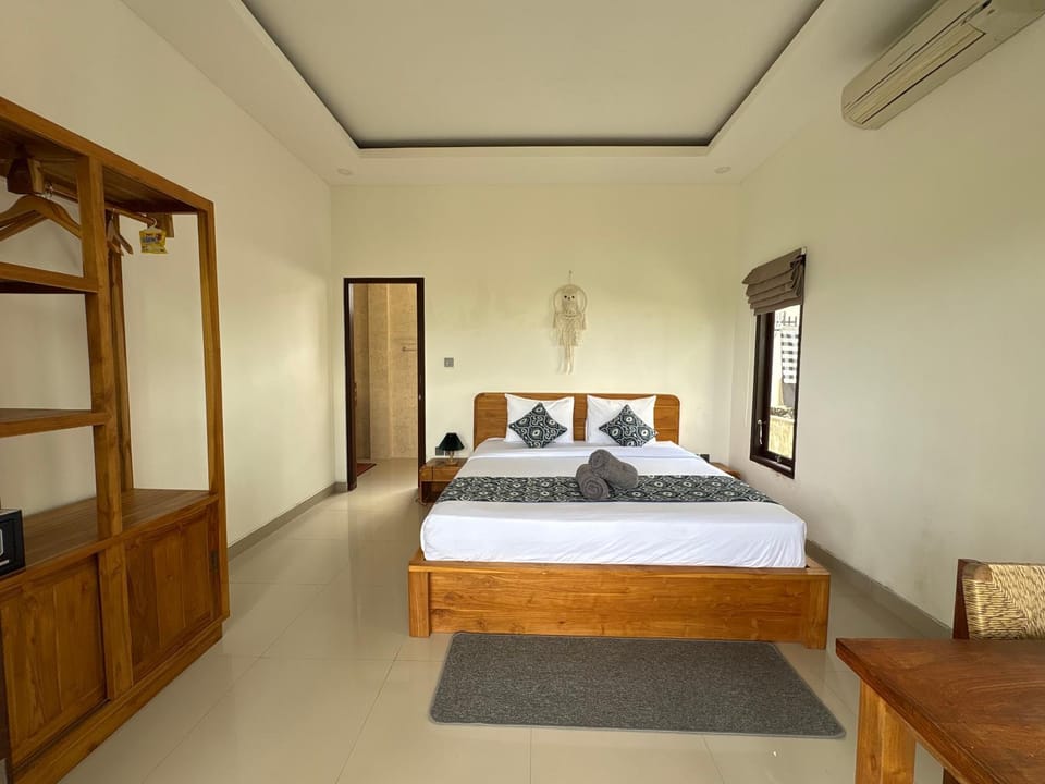 Bed, Bedroom, towels, wardrobe, air conditioner