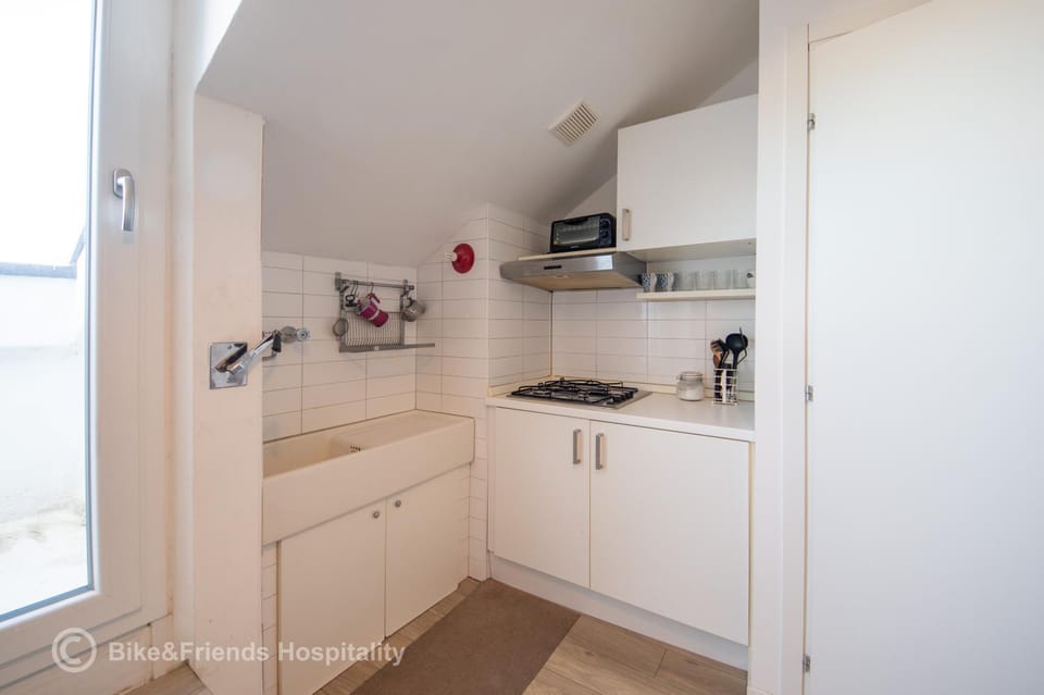 Kitchen or kitchenette, oven, stove