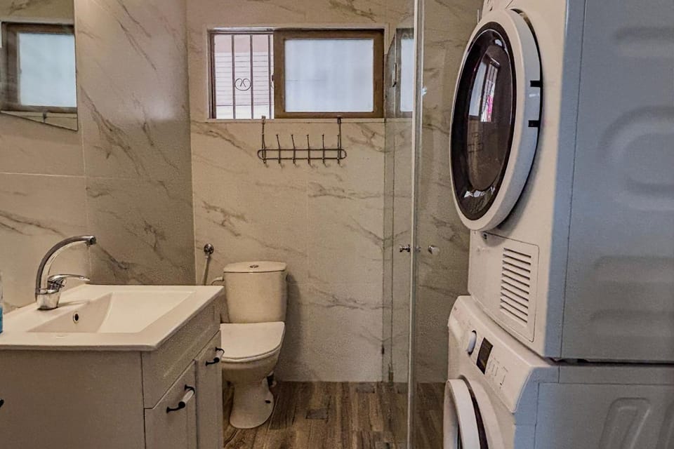 Shower, Toilet, Bathroom, hair dryier, washing machine, dryer