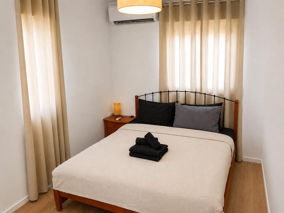 Bed, Photo of the whole room, Bedroom, towels, air conditioner